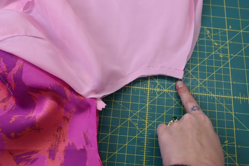 How To Sew Front Crotch Lining - Stretch Polyester Twill Lining - Mood Fabrics - Chelsea Brocade Set Free Sewing Pattern Tutorial - MDF508 - Mood Fabrics Sewciety Blog - Sew the lining front crotch seam under the zipper.