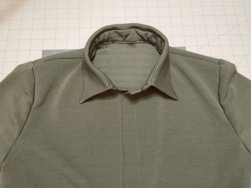 How To Sew Both Sides Of Button Placket - Stretch Liverpool Knit - Mood Fabrics - Cove Collared Wrap Top Free Sewing Pattern Tutorial - MDF498 - Mood Fabrics Sewciety Blog - Repeat for both sides of the button placket.
