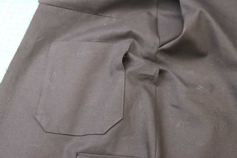 How To Seam Rip Back Pocket Side Seams - Cotton Canvas - Mood Fabrics - Clarkston Carpenter Pants Free Sewing Pattern Tutorial - MDF503 - Mood Fabrics Sewciety Blog - Seam rip gaps into the back pocket and side seam for the strap.