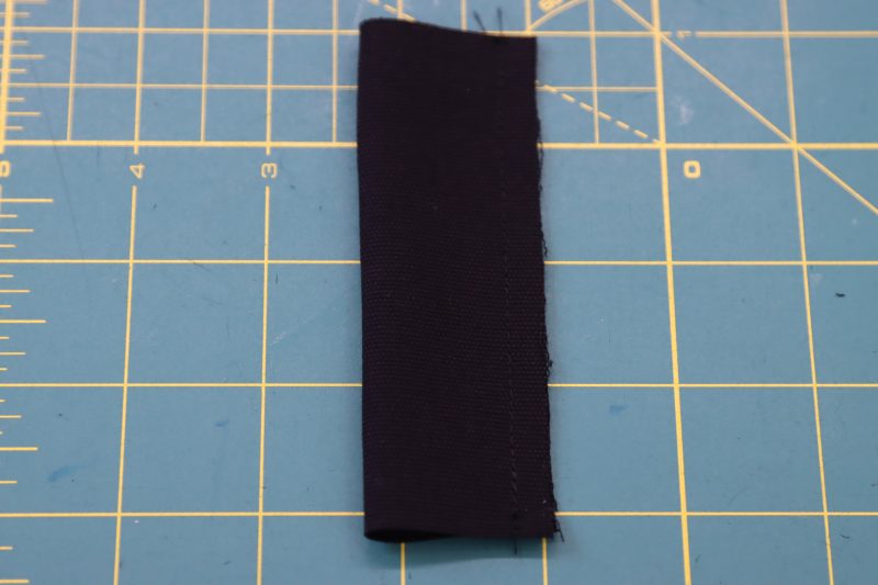 How To Sew Strap Right Sides Together - Cotton Canvas - Mood Fabrics - Clarkston Carpenter Pants Free Sewing Pattern Tutorial - MDF503 - Mood Fabrics Sewciety Blog - Sew the strap right sides together.