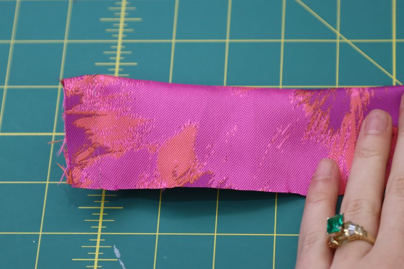 How To Sew Waistband Ends - Luxury Polyester Brocade - Mood Fabrics - Chelsea Brocade Set Free Sewing Pattern Tutorial - MDF508 - Mood Fabrics Sewciety Blog - Sew the ends of the waistband.