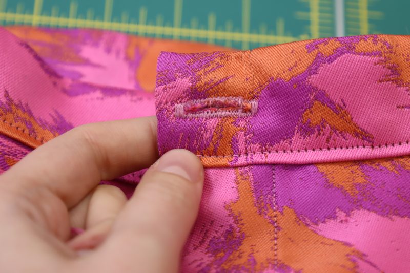 How To Sew Buttonhole - Gutermann Sew All Thread - Mood Fabrics - Chelsea Brocade Set Free Sewing Pattern Tutorial - MDF508 - Mood Fabrics Sewciety Blog - Sew a buttonhole using the buttonhole foot on your sewing machine.