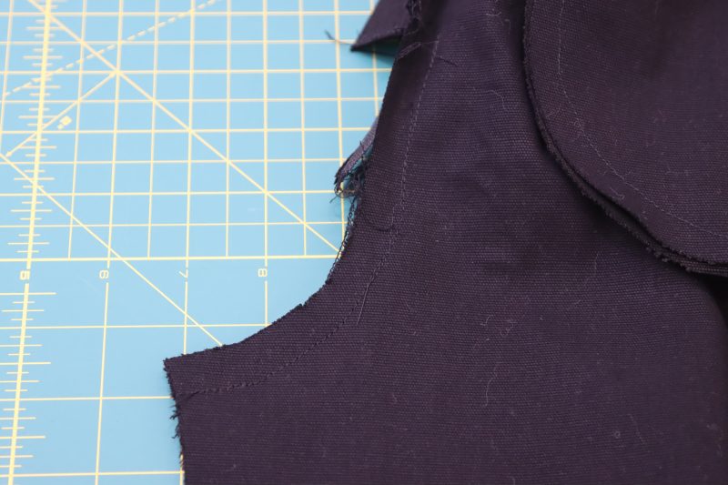 How To Pin Sew Front Crotch - Cotton Canvas - Mood Fabrics - Clarkston Carpenter Pants Free Sewing Pattern Tutorial - MDF503 - Mood Fabrics Sewciety Blog - Pin and sew the front crotch seam.