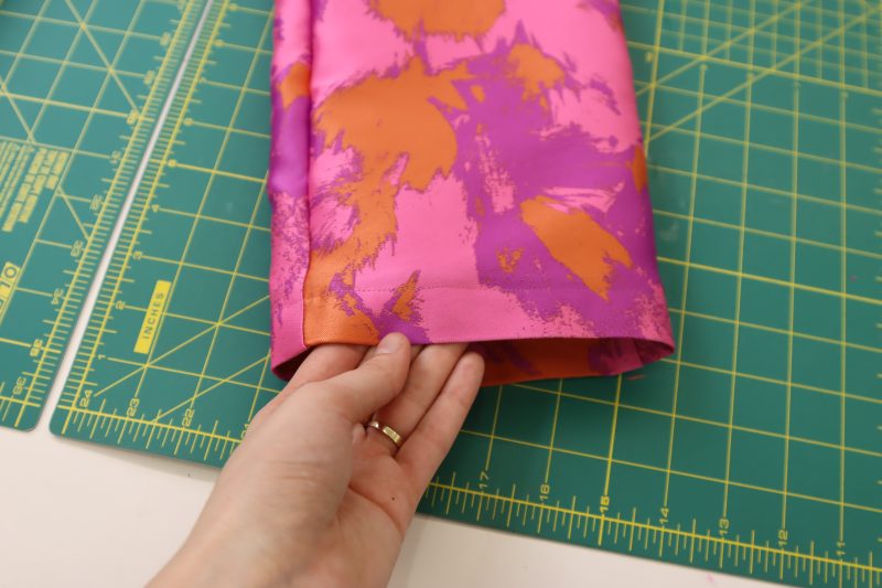 How To Sew Brocade Hem - Luxury Polyester Brocade - Mood Fabrics - Chelsea Brocade Set Free Sewing Pattern Tutorial - MDF508 - Mood Fabrics Sewciety Blog - Sew a 1 inch hem on the brocade pants.