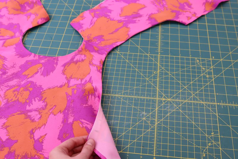 How To Flip Top Right Sides Out - Luxury Polyester Brocade - Mood Fabrics - Chelsea Brocade Set Free Sewing Pattern Tutorial - MDF508 - Mood Fabrics Sewciety Blog - Flip the top right sides out and press the armscye.