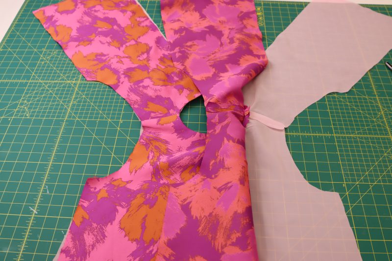 How To Open Shell From Lining - Luxury Polyester Brocade - Mood Fabrics - Chelsea Brocade Set Free Sewing Pattern Tutorial - MDF508 - Mood Fabrics Sewciety Blog - Separate the lining from the shell on the wearer’s left side.