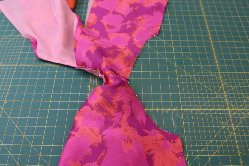 How To Pin Sew Opposite Armscye - Luxury Polyester Brocade - Mood Fabrics - Chelsea Brocade Set Free Sewing Pattern Tutorial - MDF508 - Mood Fabrics Sewciety Blog - Pin and sew the opposite armscye.