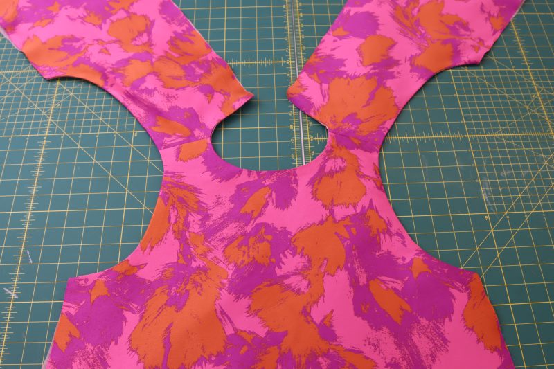 How To Press Armscyes - Luxury Polyester Brocade - Mood Fabrics - Chelsea Brocade Set Free Sewing Pattern Tutorial - MDF508 - Mood Fabrics Sewciety Blog - Press the opposite armscye so that the lining isn’t peeking out.