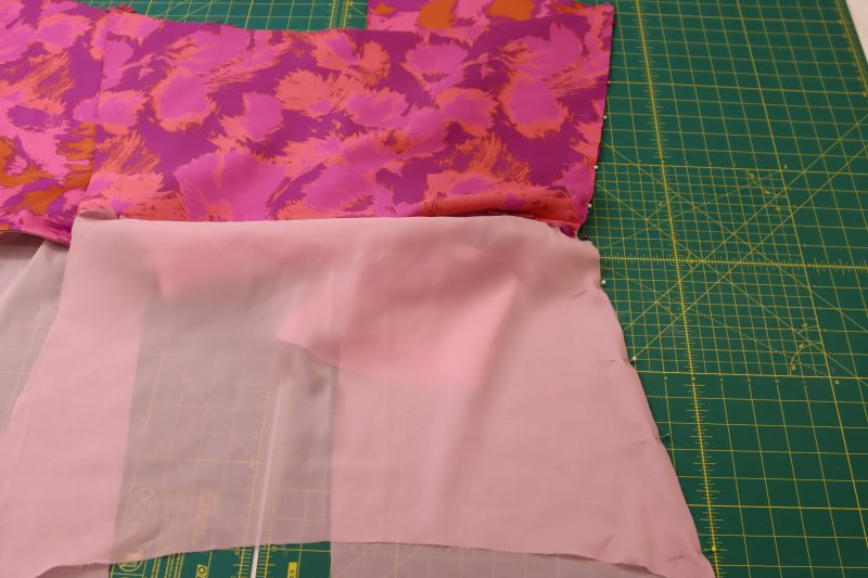How To Flip Brocade Away From Lining - Luxury Polyester Brocade - Mood Fabrics - Chelsea Brocade Set Free Sewing Pattern Tutorial - MDF508 - Mood Fabrics Sewciety Blog - Flip the brocade pieces up and pin them right sides together.
