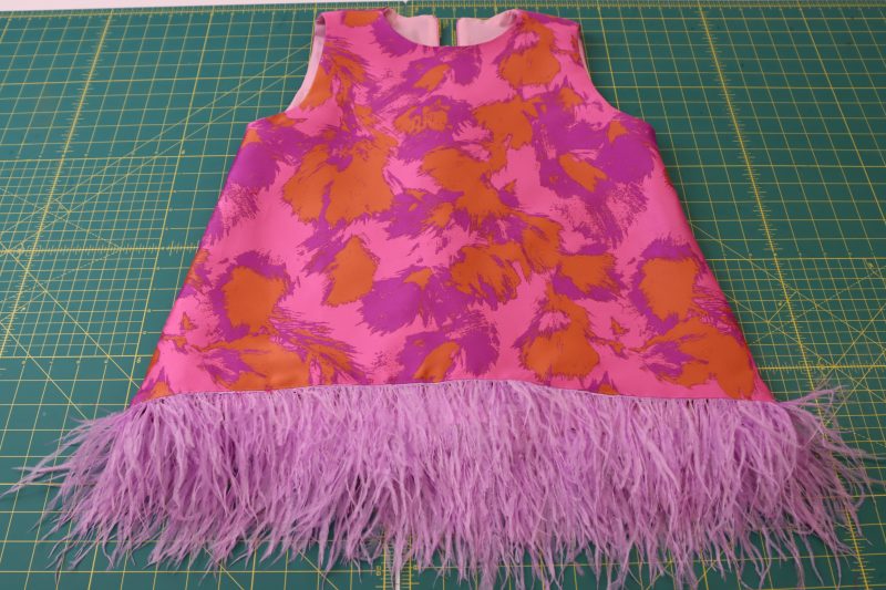 How To Flip Trim Down - Ostrich Feather Trim - Mood Fabrics - Chelsea Brocade Set Free Sewing Pattern Tutorial - MDF508 - Mood Fabrics Sewciety Blog - Flip the trim down.