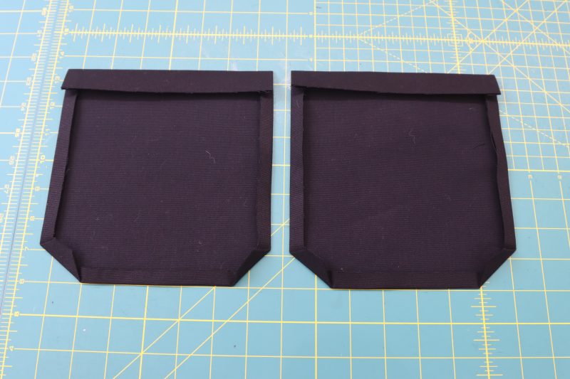 How To Fold Back Pocket Raw Edges - Cotton Canvas - Mood Fabrics - Colfax Carpenter Pants Free Sewing Pattern Tutorial - MDF504 - Mood Fabrics Sewciety Blog - Fold and press the edges of the back pockets.