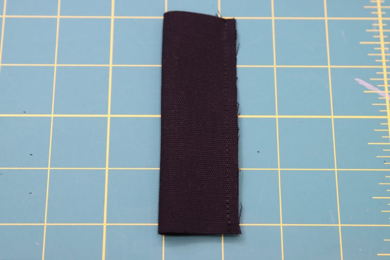 How To Sew Strap Right Sides Together - Cotton Canvas - Mood Fabrics - Colfax Carpenter Pants Free Sewing Pattern Tutorial - MDF504 - Mood Fabrics Sewciety Blog - Sew the strap right sides together into a loop.