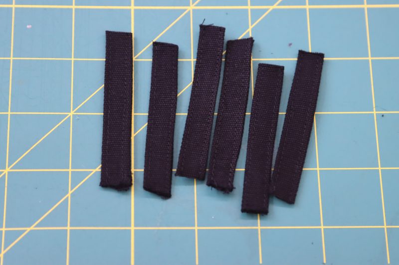 How To Topstitch Belt Loops - Cotton Canvas - Mood Fabrics - Colfax Carpenter Pants Free Sewing Pattern Tutorial - MDF504 - Mood Fabrics Sewciety Blog - Topstitch the belt loops and cut into 6 pieces.
