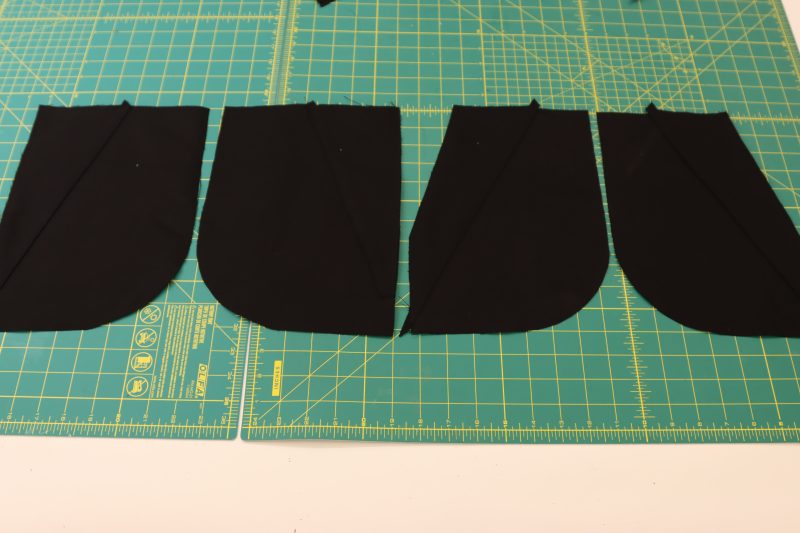 How To Pin Sew Pocket Facings - Cotton Canvas - Mood Fabrics - Colfax Carpenter Pants Free Sewing Pattern Tutorial - MDF504 - Mood Fabrics Sewciety Blog - Pin and sew the wrong side of the pocket facings to the right side of the front pockets.