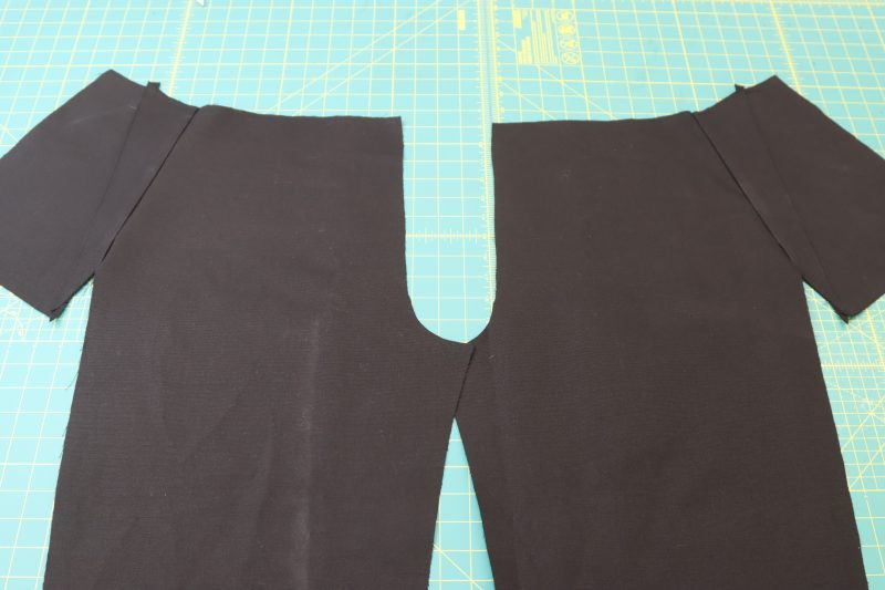 How To Sew Both Front Pockets - Cotton Canvas - Mood Fabrics - Colfax Carpenter Pants Free Sewing Pattern Tutorial - MDF504 - Mood Fabrics Sewciety Blog - Sew both the A and B pockets to the fronts and backs of the pants.