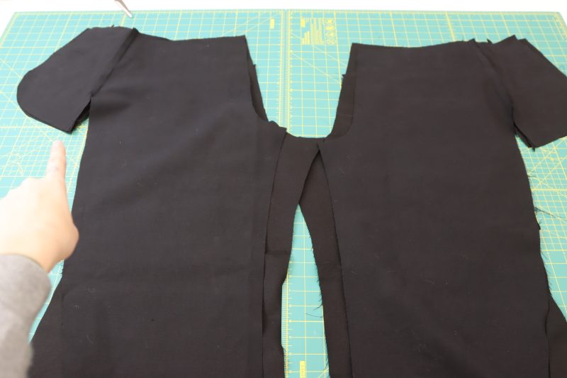 How To Place Front Pants Back Pants Right Sides Together - Cotton Canvas - Mood Fabrics - Colfax Carpenter Pants Free Sewing Pattern Tutorial - MDF504 - Mood Fabrics Sewciety Blog - Place the front pants pieces on top of the back pants pieces right sides together with the pockets and side seams lined up.