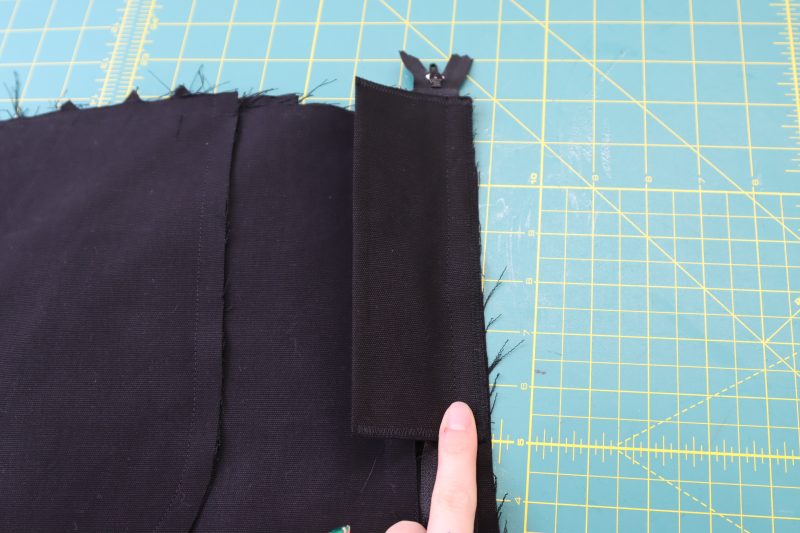 How To Sew Zipper Between Fly Shield And Pants - Regular Zipper - Mood Fabrics - Colfax Carpenter Pants Free Sewing Pattern Tutorial - MDF504 - Mood Fabrics Sewciety Blog - Sew the zipper between the front right pant leg and the fly shield.