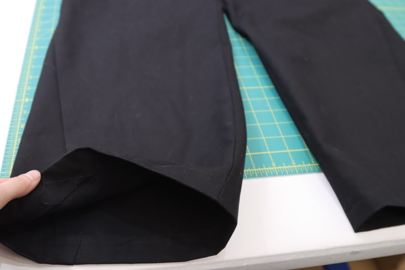 How To Sew Pants Hem - Cotton Canvas - Mood Fabrics - Colfax Carpenter Pants Free Sewing Pattern Tutorial - MDF504 - Mood Fabrics Sewciety Blog - Press and sew a 1 inch hem into the pants.