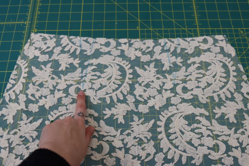 How To Mark Front Darts - Embroidered Lace - Mood Fabrics - Taiga Trapeze Skirt Free Sewing Pattern Tutorial - MDF512 - Mood Fabrics Sewciety Blog - Mark the front darts with tailor’s chalk.