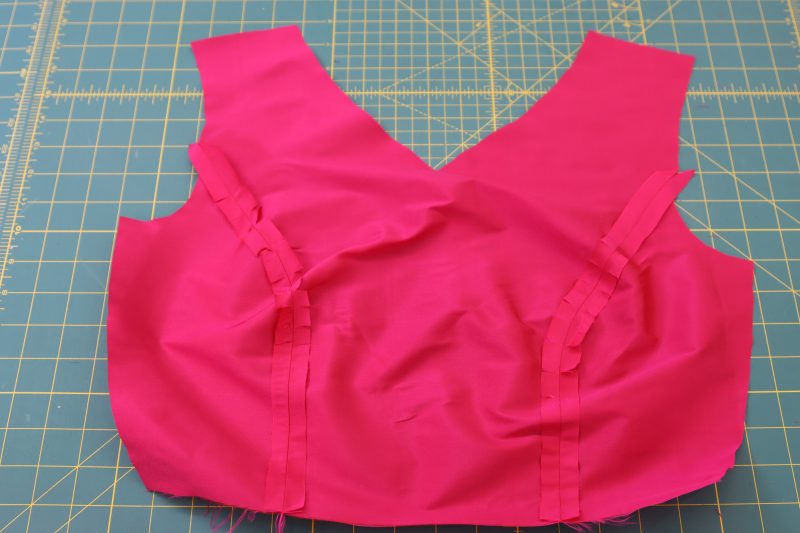 How To Sew Front Pattern Pieces - Polyester Taffeta - Mood Fabrics - Biella Fit and Flare Dress Free Sewing Pattern Tutorial - MDF514 - Mood Fabrics Sewciety Blog - Sew the front sides to the front center.