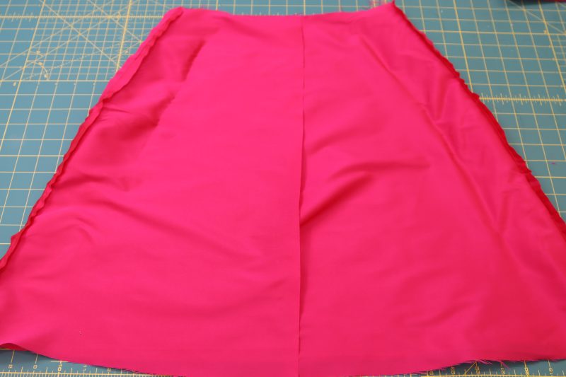 How To Sew Lining Skirt Side Seams - Polyester Taffeta - Mood Fabrics - Biella Fit and Flare Dress Free Sewing Pattern Tutorial - MDF514 - Mood Fabrics Sewciety Blog - Sew the lining skirt side seams.