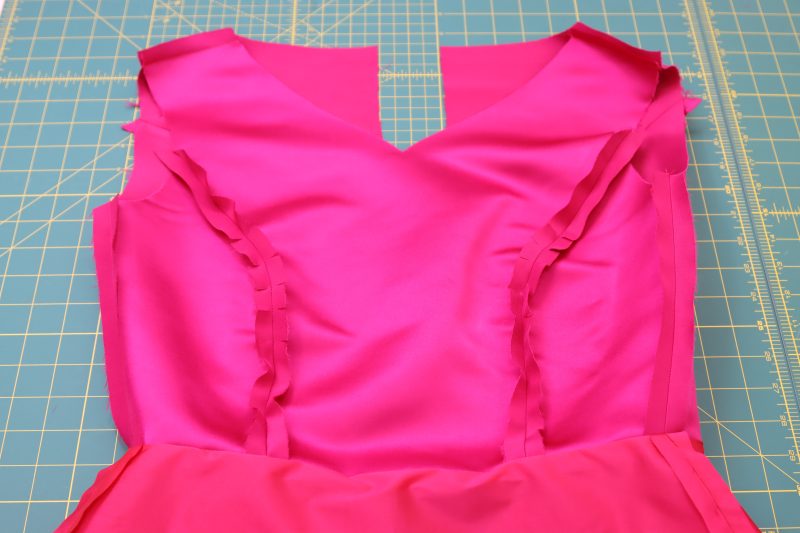 How To Sew Lining Skirt To Lining Bodice - Polyester Satin - Mood Fabrics - Biella Fit and Flare Dress Free Sewing Pattern Tutorial - MDF514 - Mood Fabrics Sewciety Blog - Sew the lining skirt to the lining top.