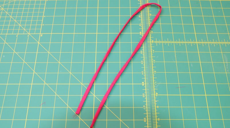 How To Flip Tube Right Sides Out - Polyester Taffeta - Mood Fabrics - Biella Fit and Flare Dress Free Sewing Pattern Tutorial - MDF514 - Mood Fabrics Sewciety Blog - Flip the tube right sides out.