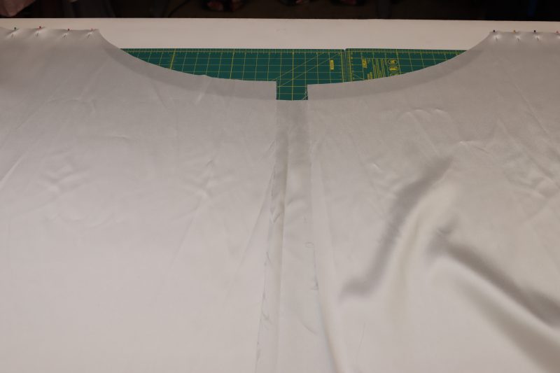 How To Pin Sew Outer Skirt Side Seams Together - Polyester Lining - Mood Fabrics - Selenite V Waist Ballgown Free Sewing Pattern Tutorial - MDF515 - Mood Fabrics Sewciety Blog - Pin the side seams of the outer skirt.