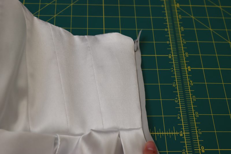 How To Flip Dress Right Side Out After Sewing - Invisible Zipper - Mood Fabrics - Selenite V Waist Ballgown Free Sewing Pattern Tutorial - MDF515 - Mood Fabrics Sewciety Blog - Flip the dress right sides out.