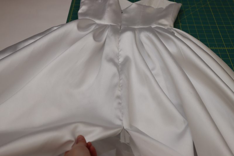How To Press Center Back Seam Along Zipper Flat - Invisible Zipper - Mood Fabrics - Selenite V Waist Ballgown Free Sewing Pattern Tutorial - MDF515 - Mood Fabrics Sewciety Blog - Press the center back seam along the zipper.