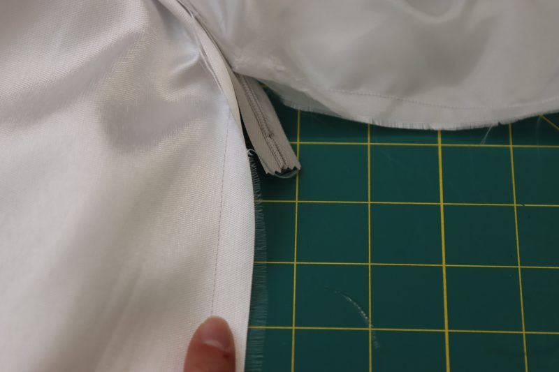 How To Sew Remaining Center Back Seam Below Zipper - Polyester Mikado - Mood Fabrics - Selenite V Waist Ballgown Free Sewing Pattern Tutorial - MDF515 - Mood Fabrics Sewciety Blog - Sew the rest of the center back seam under the zipper.
