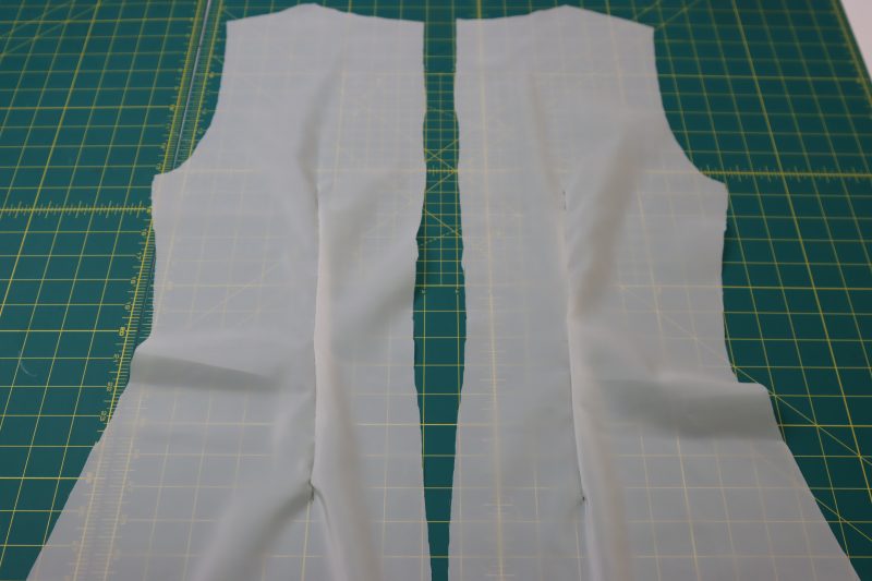 How To Sew Back Lining Darts - Stretch Polyester Twill Lining - Mood Fabrics - Deauville Cocktail Dress Free Sewing Pattern Tutorial - MDF517 - Mood Fabrics Sewciety Blog - Sew the back lining darts.