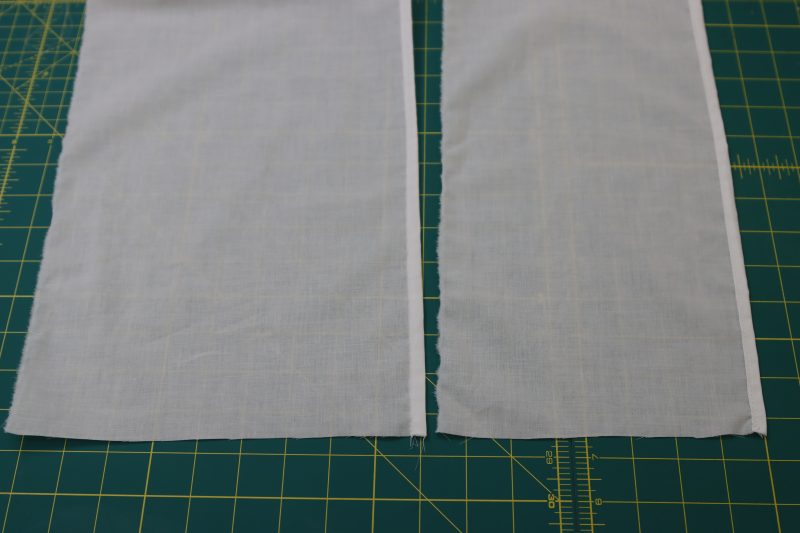 How To Sew Double Rolled Hem On Ruffle Edges - Cotton Voile - Mood Fabrics - Selenite V Waist Ballgown Free Sewing Pattern Tutorial - MDF515 - Mood Fabrics Sewciety Blog - Sew a double rolled ¼ inch hem on one of the long sides of each of the ruffles.
