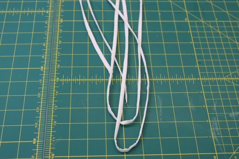 How To Turn Lacing Strips Right Side Out Cleanly - Cotton Voile - Mood Fabrics - Selenite V Waist Ballgown Free Sewing Pattern Tutorial - MDF515 - Mood Fabrics Sewciety Blog - Flip the strips right sides out.