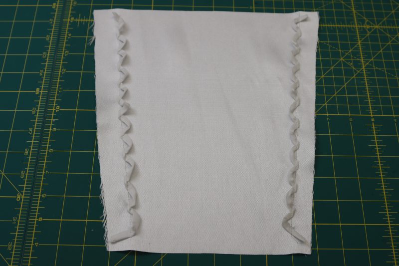 How To Sew Loops Securely Onto Sleeve Cuff - Gutermann Sew All Thread - Mood Fabrics - Selenite V Waist Ballgown Free Sewing Pattern Tutorial - MDF515 - Mood Fabrics Sewciety Blog - Sew the loops to the sleeve cuff.