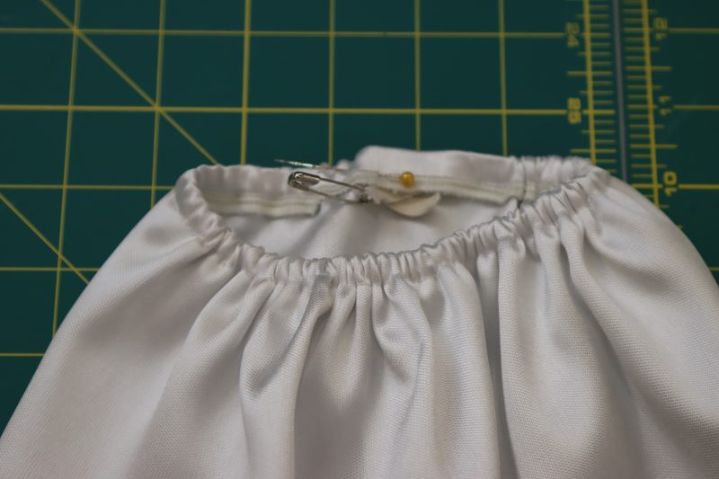 How To Insert Elastic Through Sleeve Casing Channel - Quarter Inch Elastic - Mood Fabrics - Selenite V Waist Ballgown Free Sewing Pattern Tutorial - MDF515 - Mood Fabrics Sewciety Blog - Insert the elastic into the channel you just sewed.