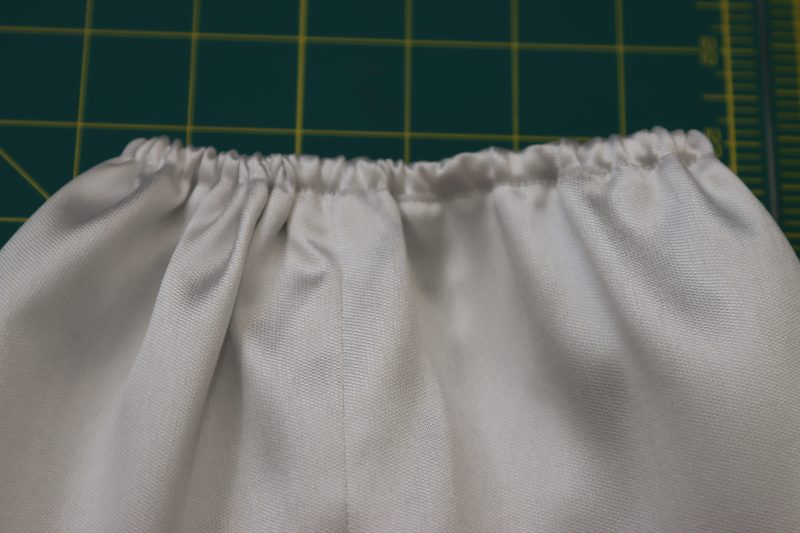 How To Sew Elastic Into Closed Loop And Secure - Quarter Inch Elastic - Mood Fabrics - Selenite V Waist Ballgown Free Sewing Pattern Tutorial - MDF515 - Mood Fabrics Sewciety Blog - Sew the elastic into a closed loop and sew the channel shut.