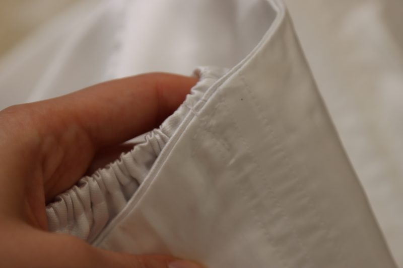 How To Attach Sleeve To Bodice At Armhole Seam - Gutermann Sew All Thread - Mood Fabrics - Selenite V Waist Ballgown Free Sewing Pattern Tutorial - MDF515 - Mood Fabrics Sewciety Blog - Sew the top of the sleeve to the side seam of the bodice.