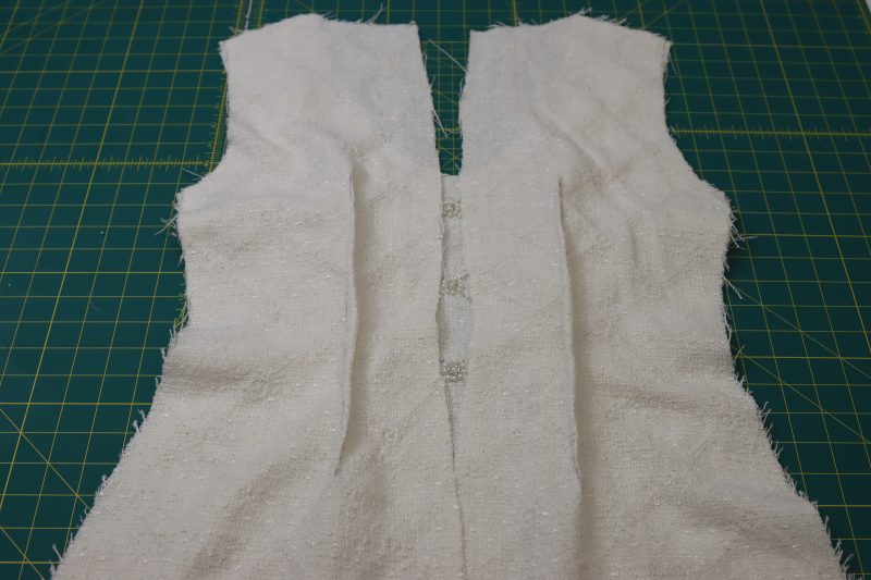 How To Layout Back Dress Pieces Onto Front Dress Piece - Beaded Tweed - Mood Fabrics - Deauville Cocktail Dress Free Sewing Pattern Tutorial - MDF517 - Mood Fabrics Sewciety Blog - Layout the back dress pieces onto the front dress piece, right sides together.
