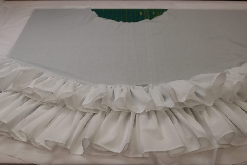 How To Sew Top Ruffle To Petticoat Securely - Cotton Voile - Mood Fabrics - Selenite V Waist Ballgown Free Sewing Pattern Tutorial - MDF515 - Mood Fabrics Sewciety Blog - Sew the top ruffle to the petticoat.