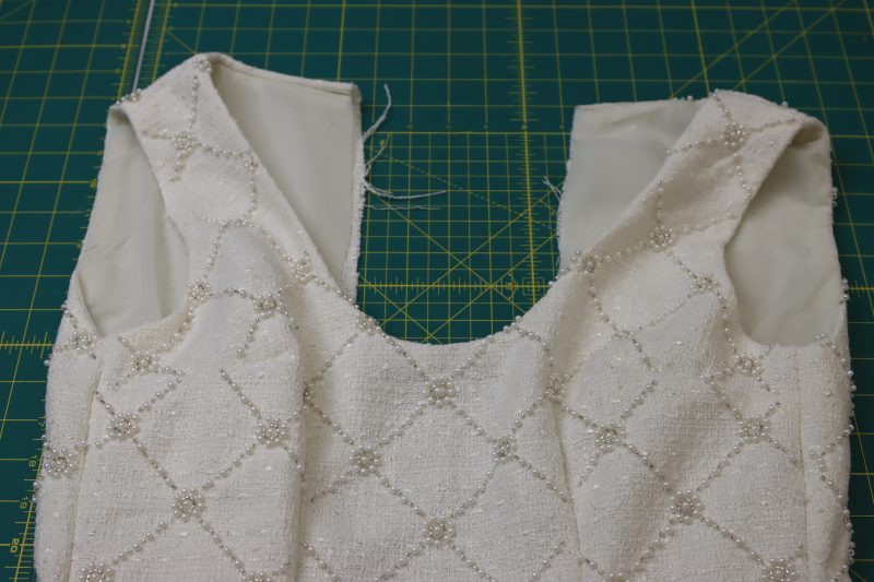 How To Sew Both Arm Holes - Stretch Polyester Twill Lining - Mood Fabrics - Deauville Cocktail Dress Free Sewing Pattern Tutorial - MDF517 - Mood Fabrics Sewciety Blog - Sew both arm holes.