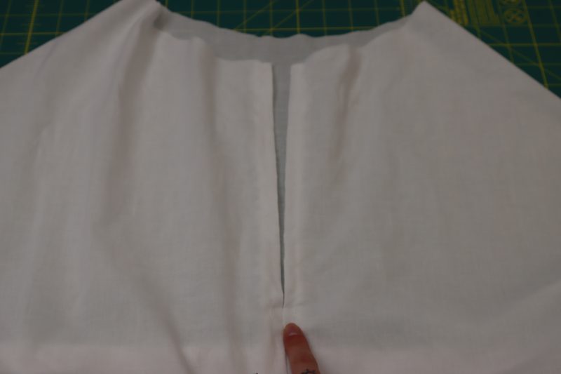 How To Topstitch Opening At Center Back Seam - Cotton Voile - Mood Fabrics - Selenite V Waist Ballgown Free Sewing Pattern Tutorial - MDF515 - Mood Fabrics Sewciety Blog - Topstitch the opening at the center back seam.