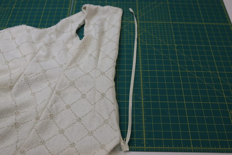 How To Sew Zipper Between Main Fabric And Lining - Invisible Zipper - Mood Fabrics - Deauville Cocktail Dress Free Sewing Pattern Tutorial - MDF517 - Mood Fabrics Sewciety Blog - Sew the zipper between the main fabric and the lining.