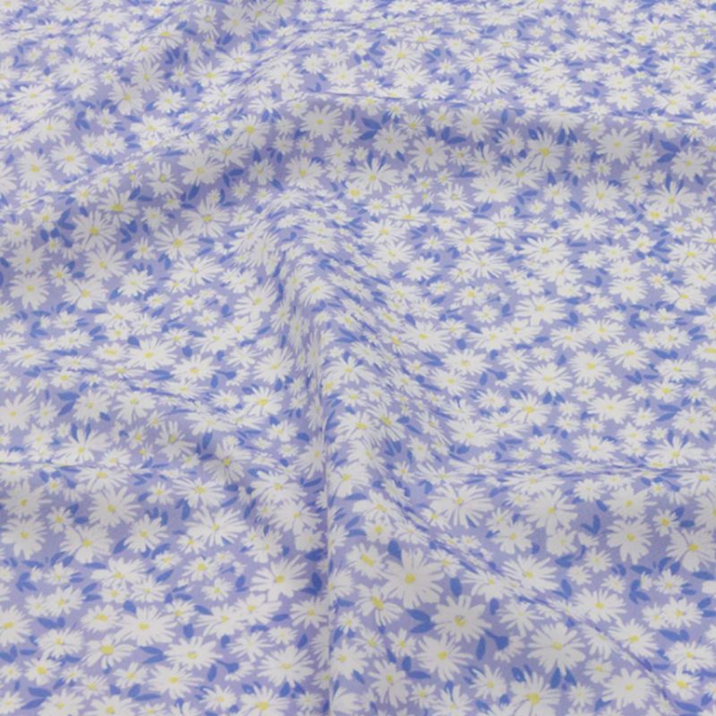 Cotton Poplin - Periwinkle and White Floral - Sunday in the Park Print - Mood Exclusive Secret Garden Collection fabric perfect for Free Resort Outfit Sewing Projects such as the Naomi Sleep Set Arbor Skort Sewing Pattern free PDF download from Mood Fabrics Sewciety Blog.