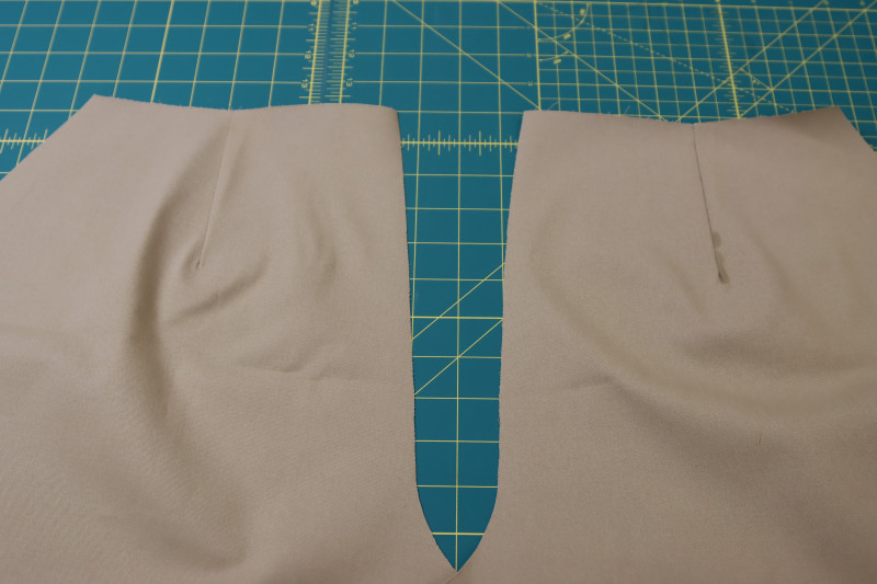 How To Sew Press Back Darts - Stretch Khaki Twill - Mood Fabrics - Lucca Tailored Barrel Leg Pants Free Sewing Pattern Tutorial - MDF524 - Mood Fabrics Sewciety Blog - Sew and press the back darts.