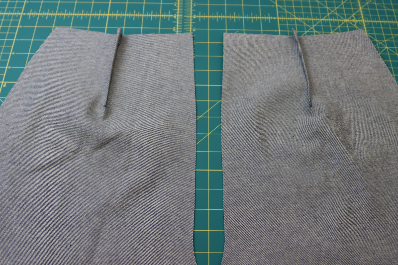 How To Sew Press Darts Pressed Toward Side Seams - Cotton Denim Twill - Mood Fabrics - Merit Jumpsuit Free Sewing Pattern Tutorial - MDF525 - Mood Fabrics Sewciety Blog - Sew the darts and press toward the side seams.