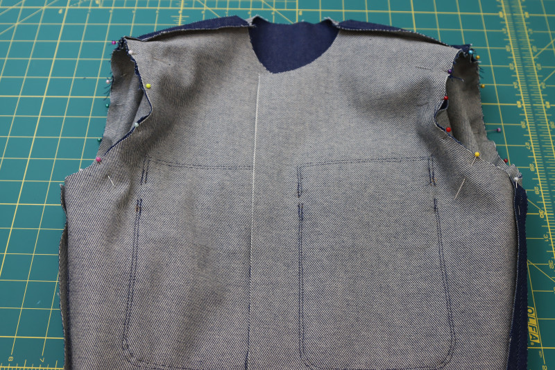 How To Pin Sleeves Set Into Armscyes - Cotton Denim Twill - Mood Fabrics - Merit Jumpsuit Free Sewing Pattern Tutorial - MDF525 - Mood Fabrics Sewciety Blog - Pin the sleeves into the top.