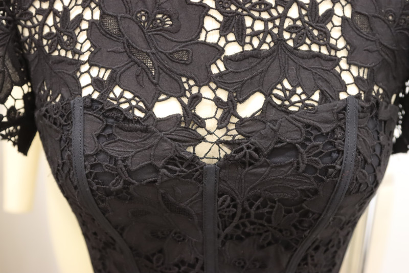 How To Place Corset Over Top Of Dress On Mannequin - Floral Guipure Lace - Mood Fabrics - Reims Soirée Dress Free Sewing Pattern Tutorial - MDF521 - Mood Fabrics Sewciety Blog - Place the corset over the top of the dress on the mannequin.