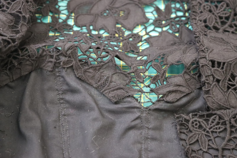 How To Trim Excess Fabric From Neckline Of Corset - Floral Guipure Lace - Mood Fabrics - Reims Soirée Dress Free Sewing Pattern Tutorial - MDF521 - Mood Fabrics Sewciety Blog - Trim the excess fabric from the neckline of the corset.