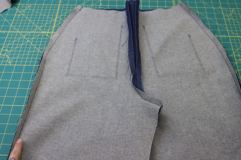 How To Pin Sew Pants Side Seams - Cotton Denim Twill - Mood Fabrics - Merit Jumpsuit Free Sewing Pattern Tutorial - MDF525 - Mood Fabrics Sewciety Blog - Pin and sew the side seams of the pants.